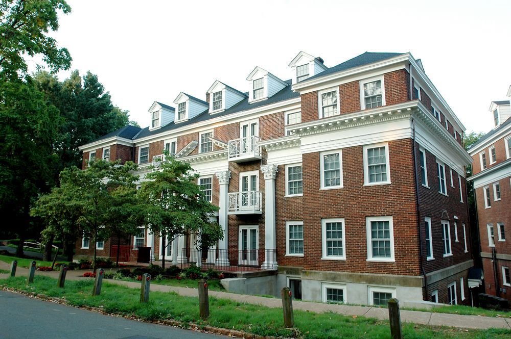 A large brick building with a lot of windows.