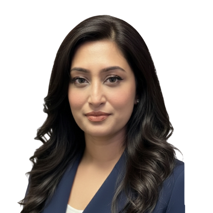 Woman with dark hair in a navy blazer, looking at the viewer.