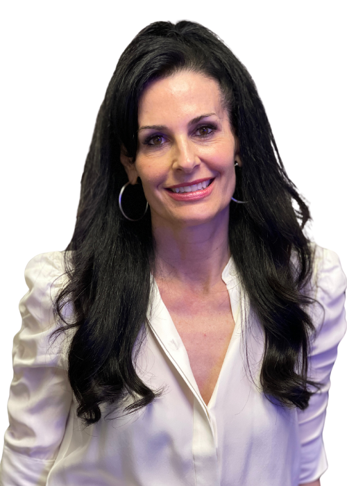 Woman with long black hair, wearing a white blouse, smiling.