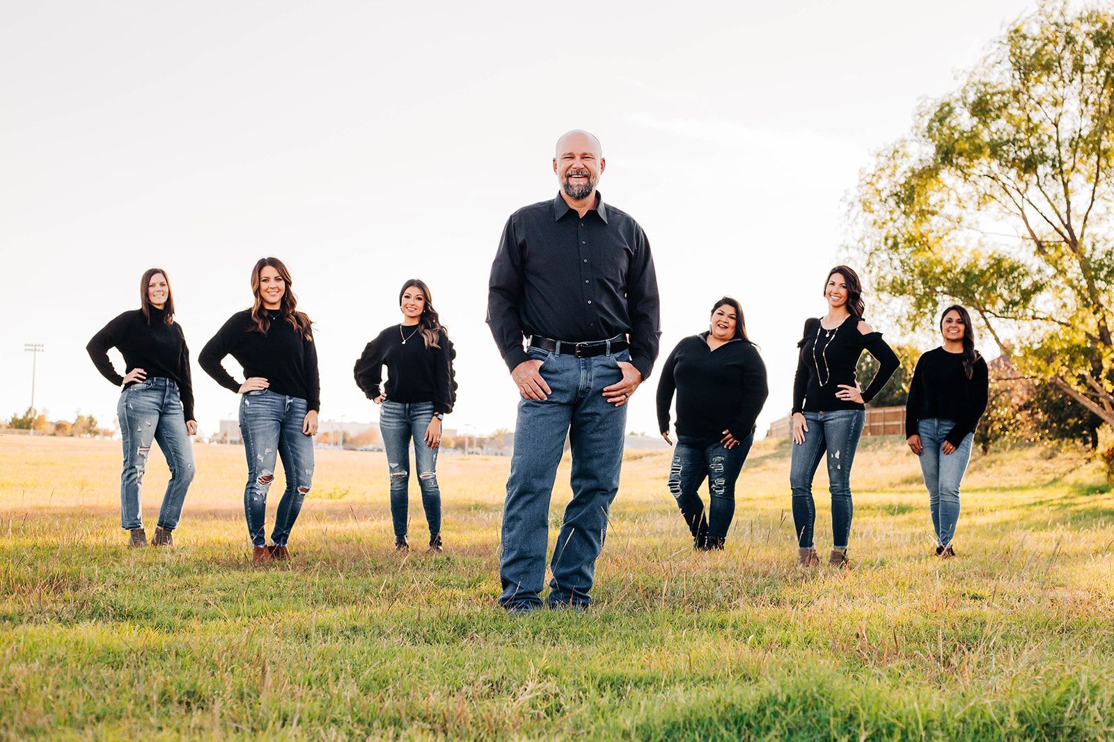 A Group of People are Posing for a Picture in a Field | Midland, TX | Sam Sowders