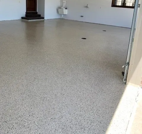 an elderly man is holding onto a stainless steel railing .