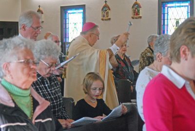 people in church singing