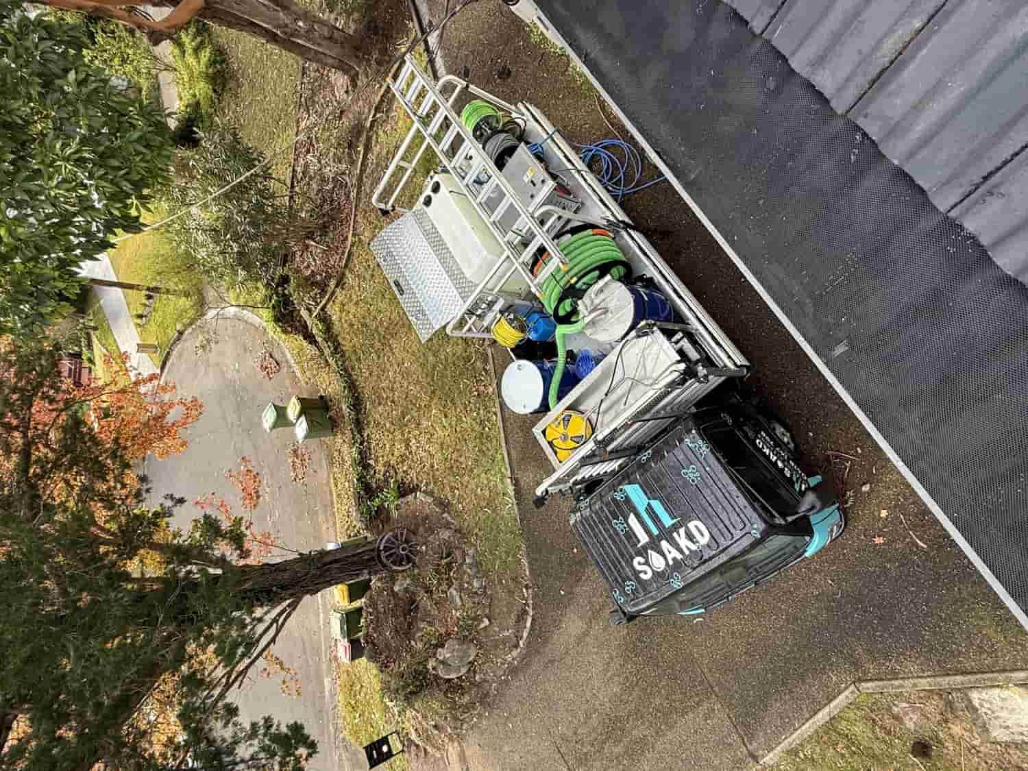 A Truck Parked Near a Building — SOAKD Exterior Cleaning in Newcastle, NSW