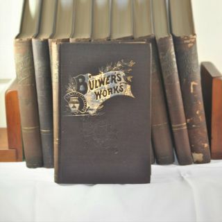 A book titled bulwers works sits on a table