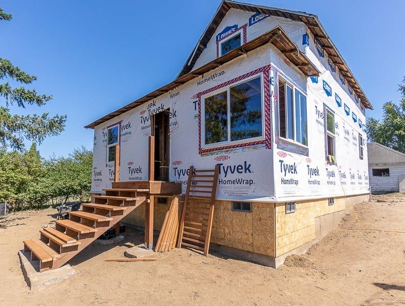 A house is being built with styrofoam and stairs.
