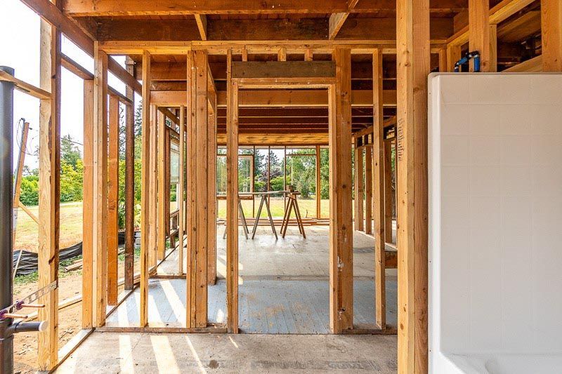 The inside of a wooden house under construction.
