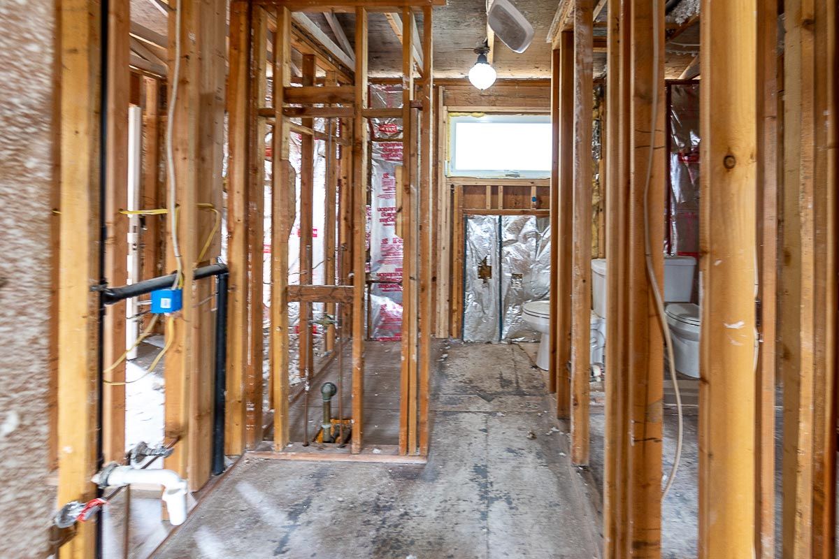 A hallway in a house that is being built.