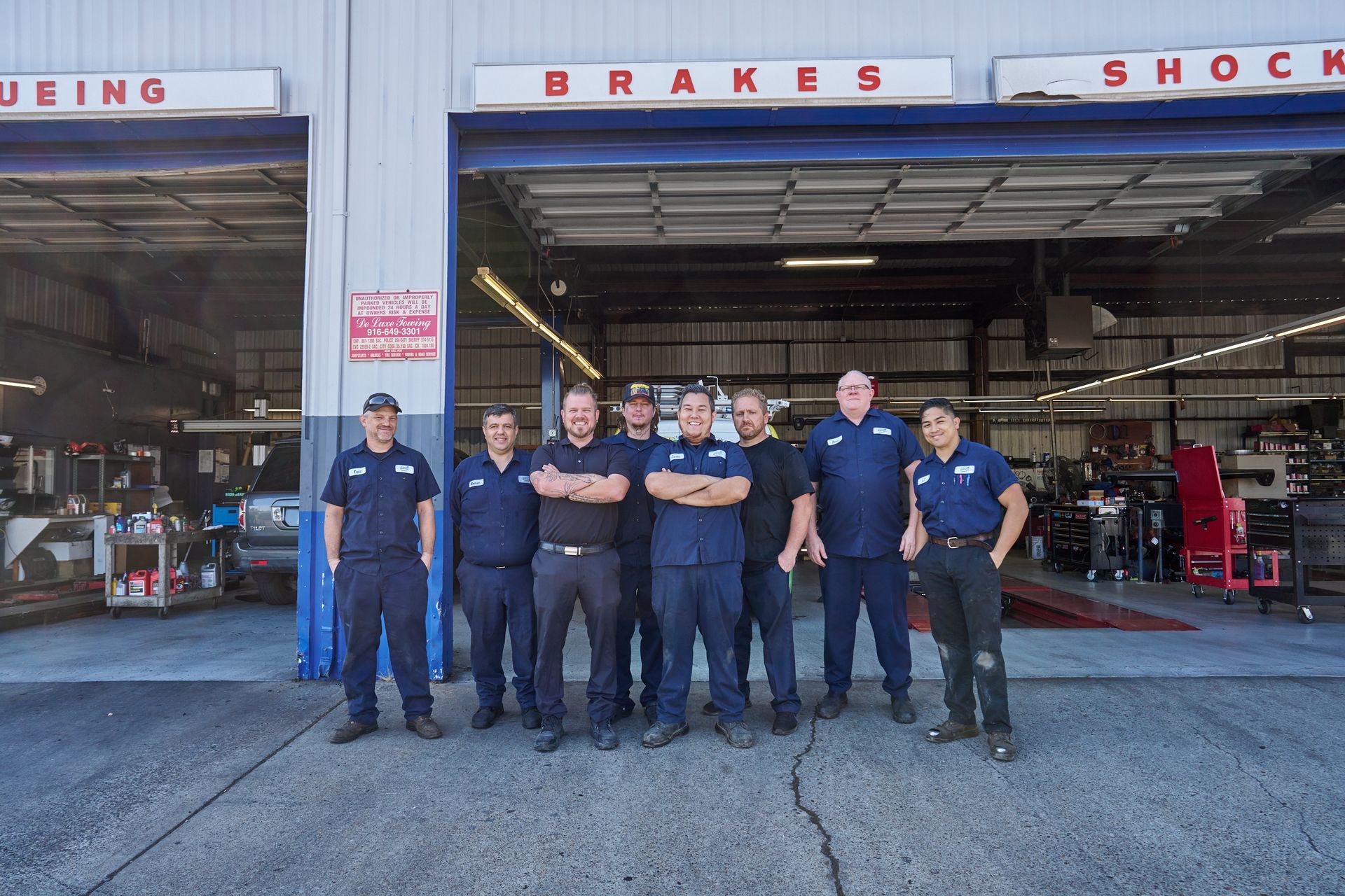 Team Photo In Front Of Alignment And Balancing Shop | Linville Brothers