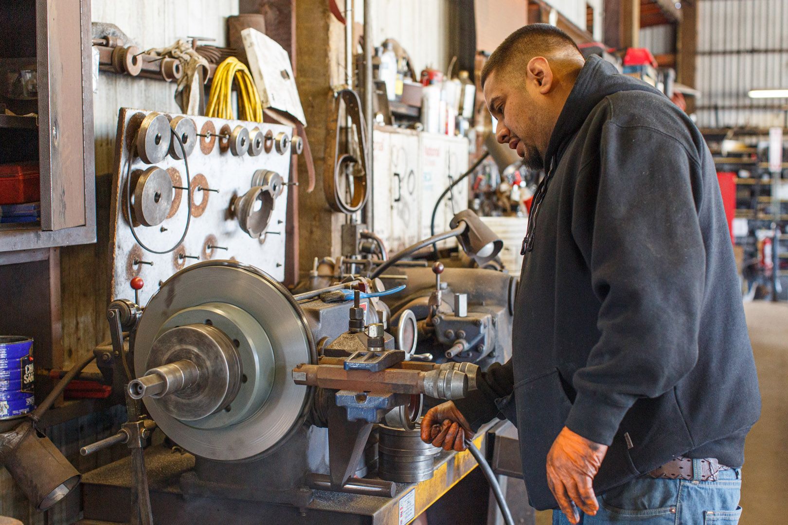Auto Technician Using Machine For Brake And Rotor Service | Linville Brothers