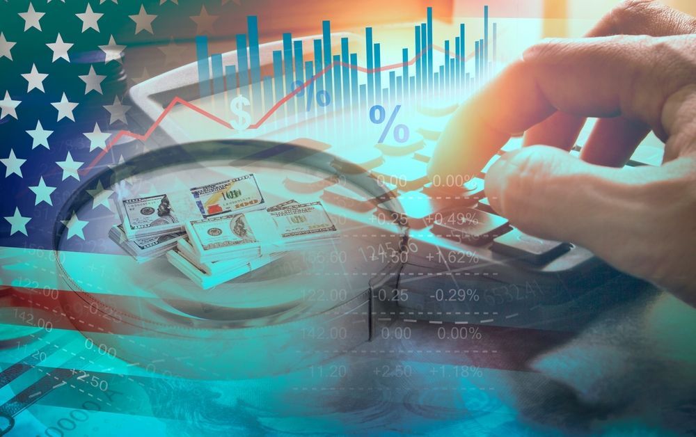 US flag overlayed with hands using a calculator, magnifying glass over money, and financial graphs.