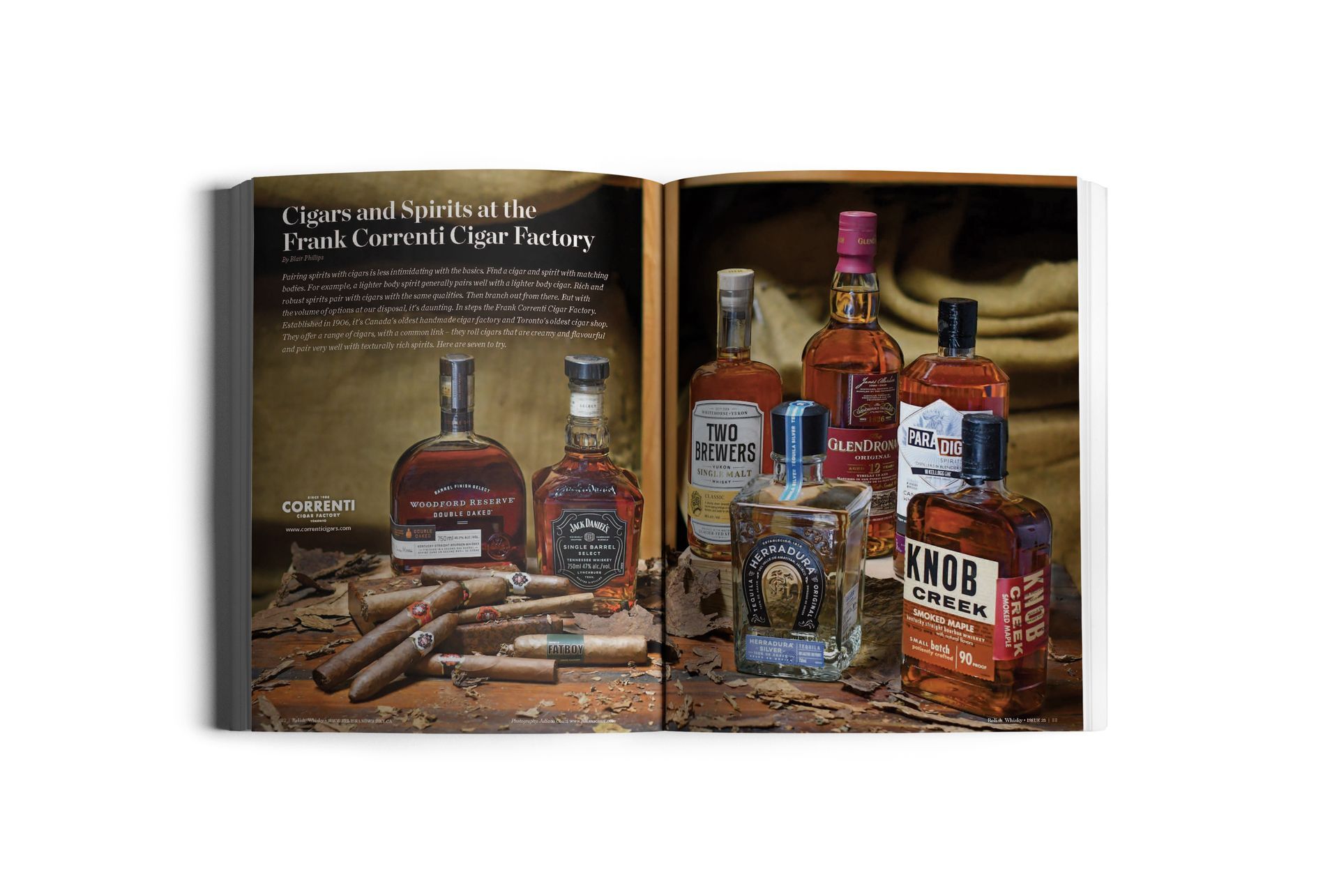 Cigars and assorted liquor bottles on a wooden surface, in a dimly lit setting.