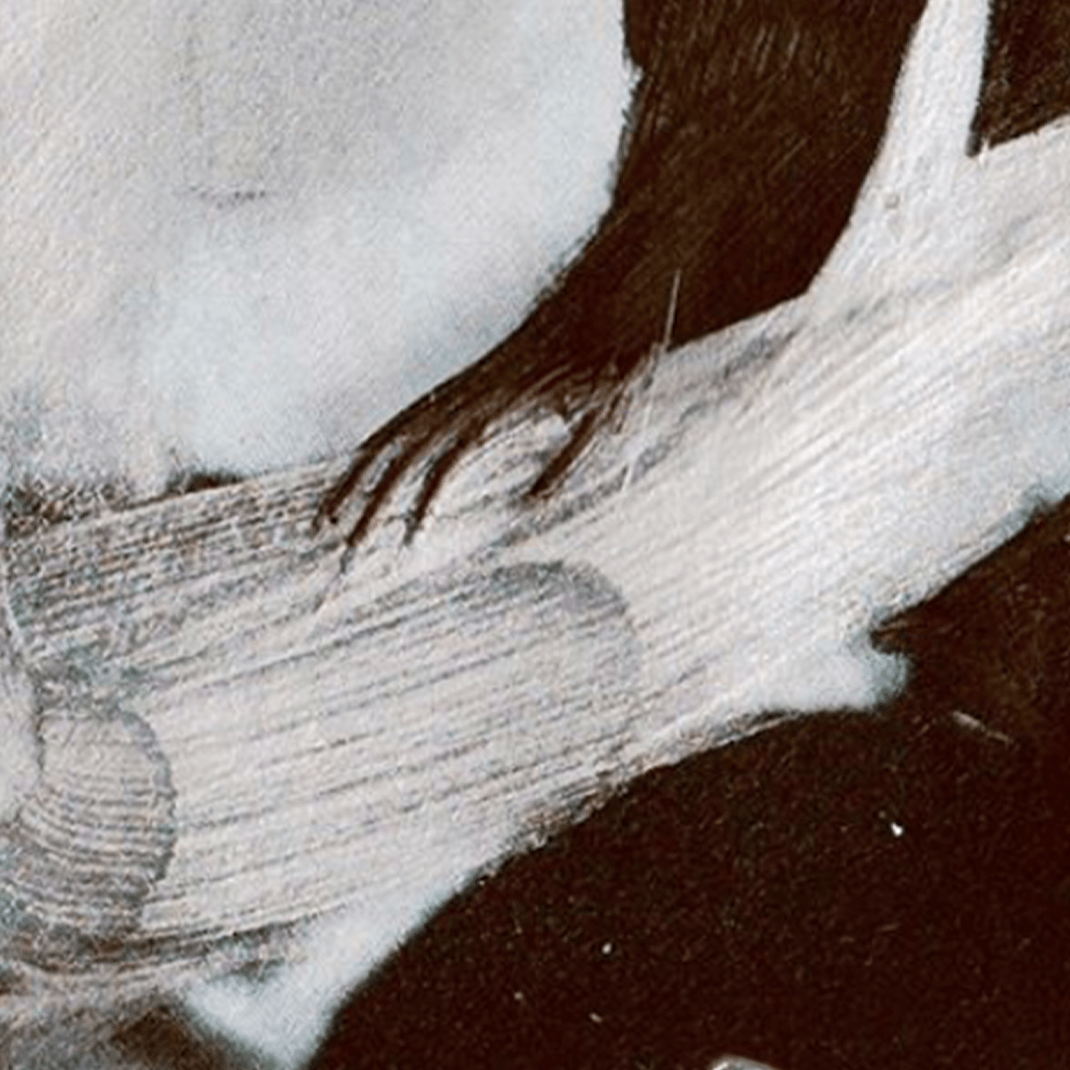 A woman with rope wrapped around her head.