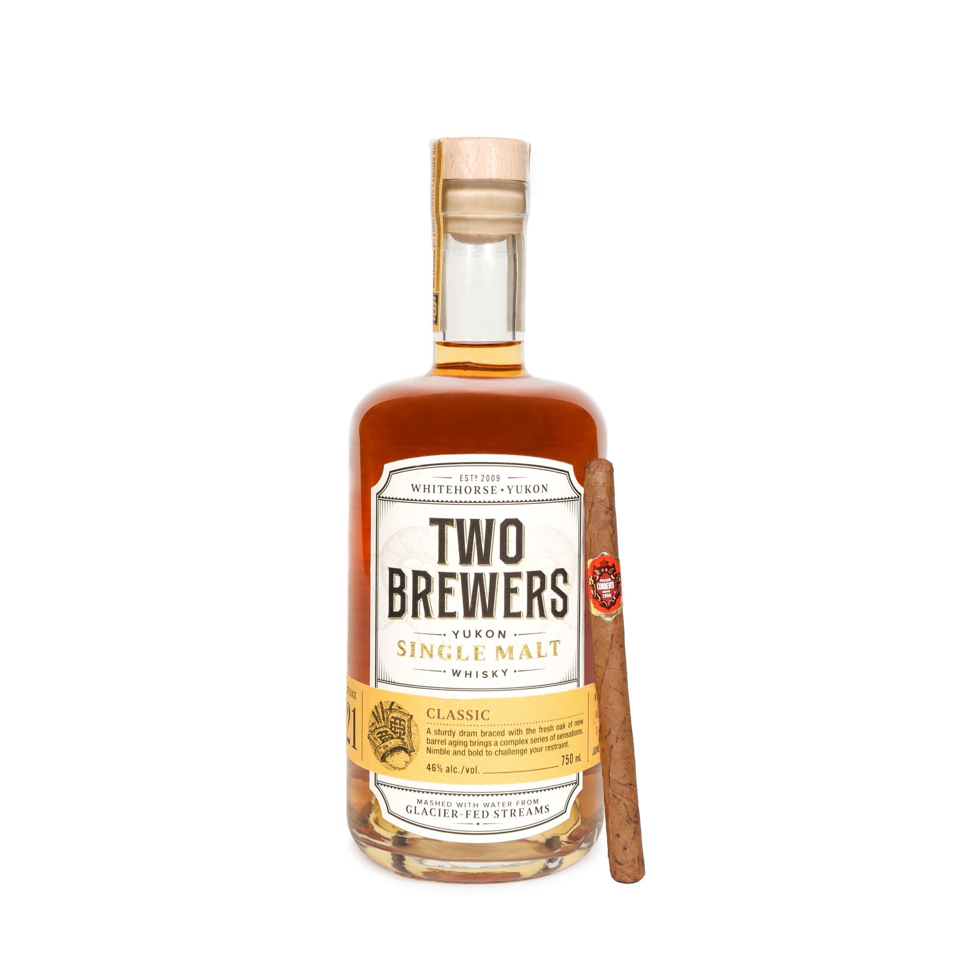 Bottle of Two Brewers single malt whisky with a cigar.