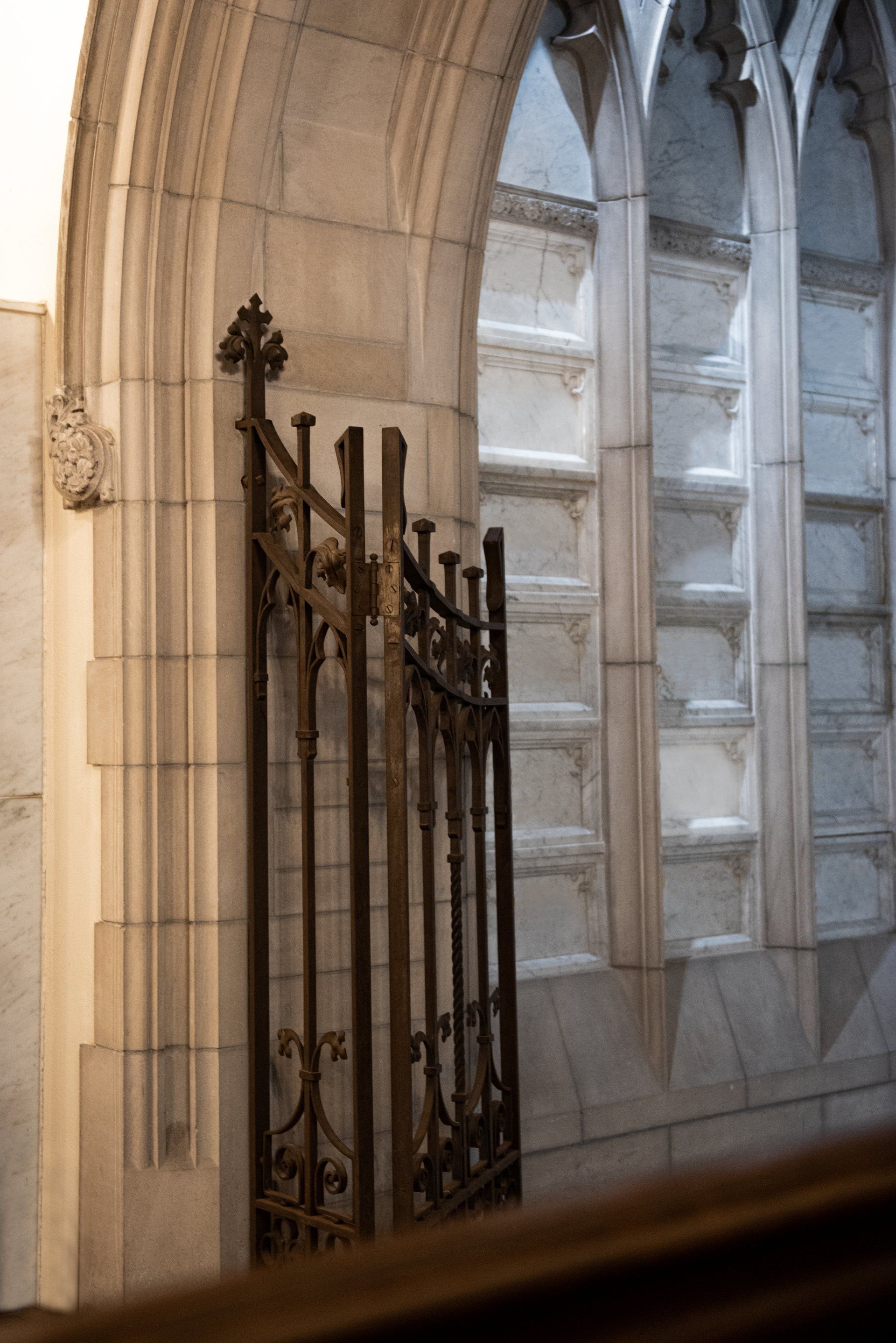 There is a gate in the middle of a church.