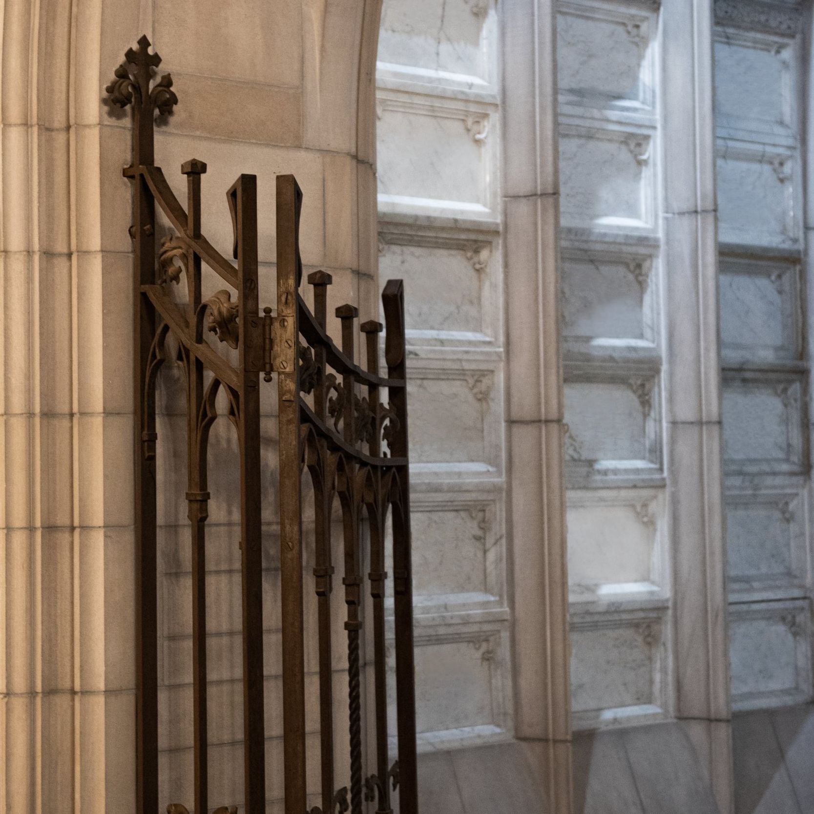 There is a gate in the middle of a church.