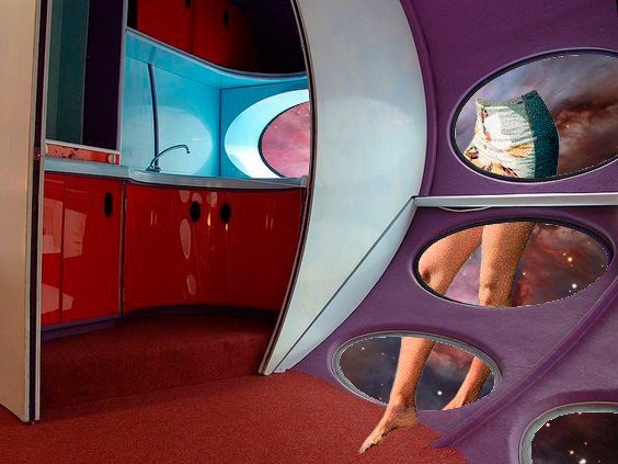 Futuristic kitchen interior with red cabinets, curved purple walls, and space-themed portals reflecting legs and a pillow.