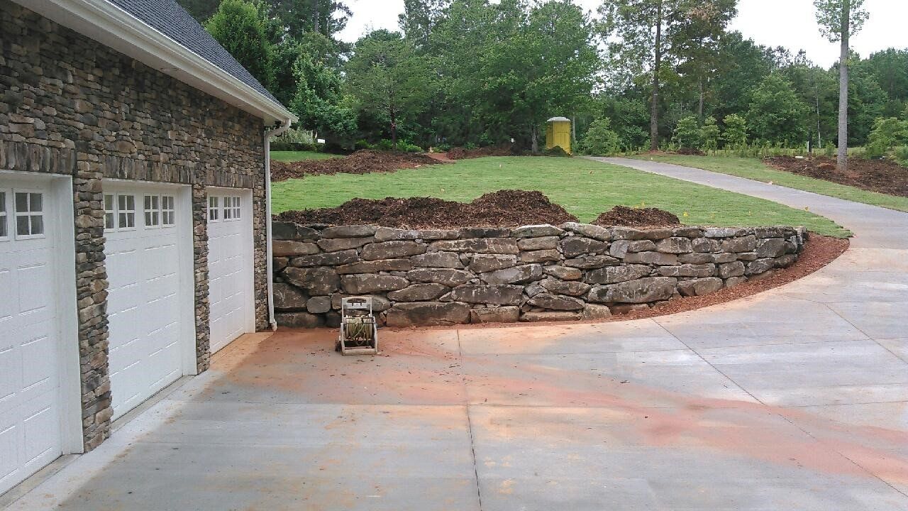 Stone Wall Near Garage — Seneca, SC — Sheriff Landscaping