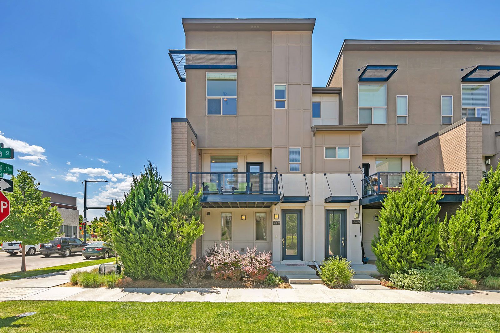 A large house with a stop sign in front of it.