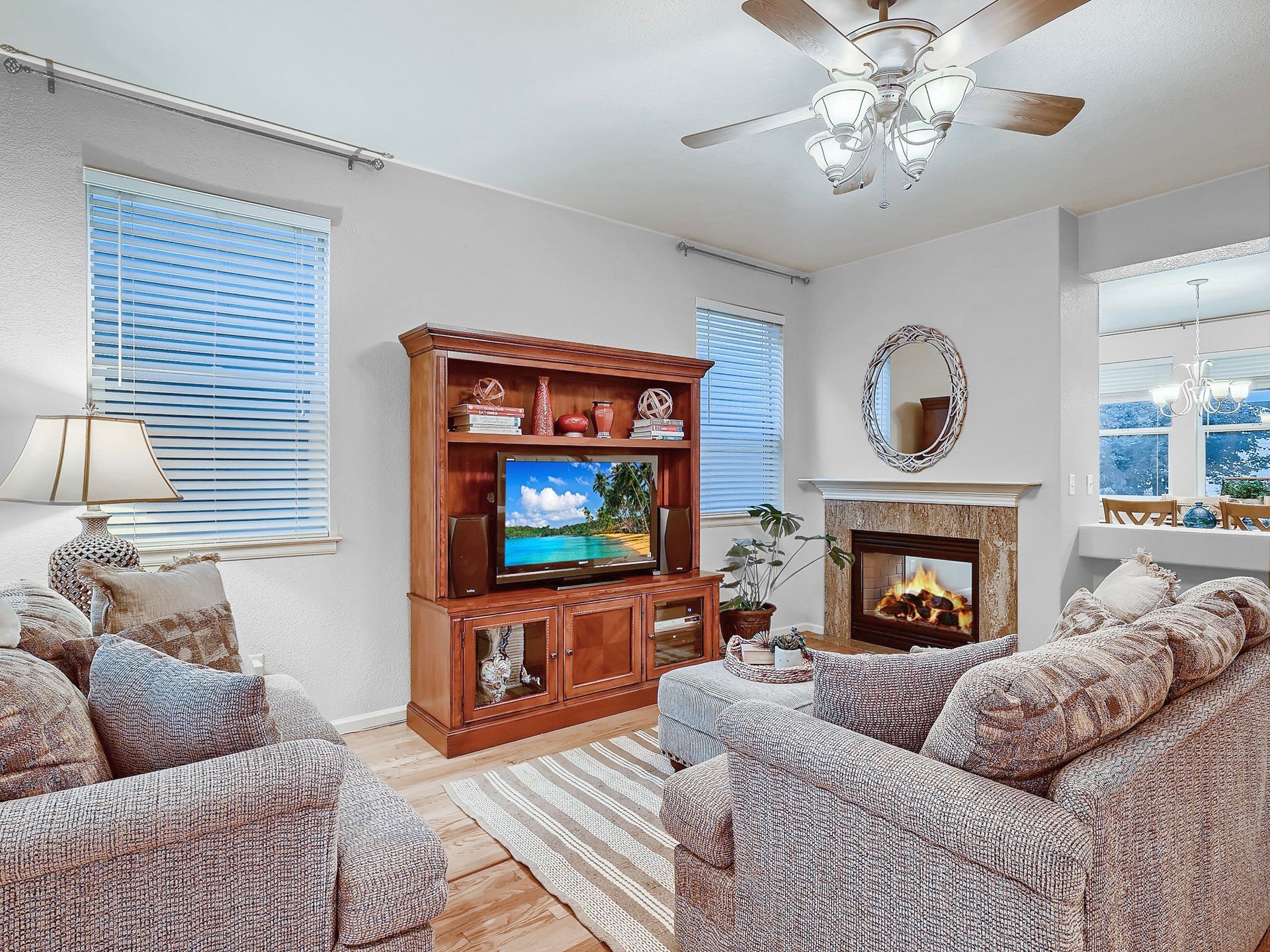 A bathroom with a toilet , sink , and shower.