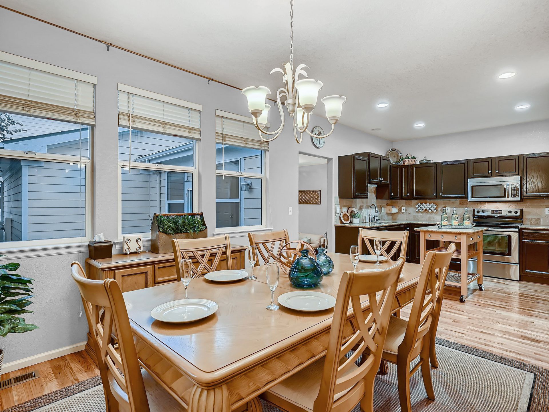 A bathroom with a toilet , sink , and shower.
