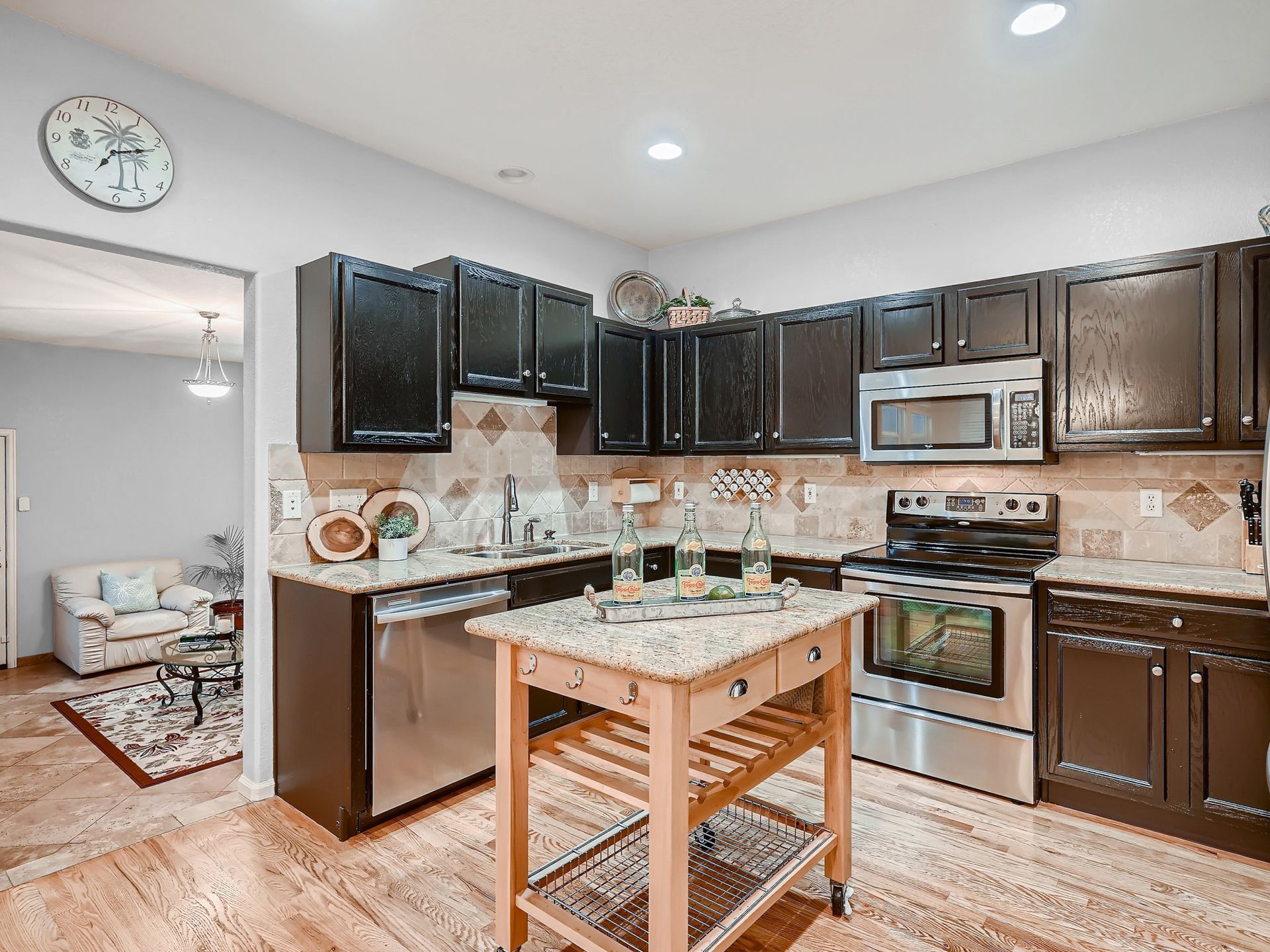 There is a spinning bike in the middle of the room.