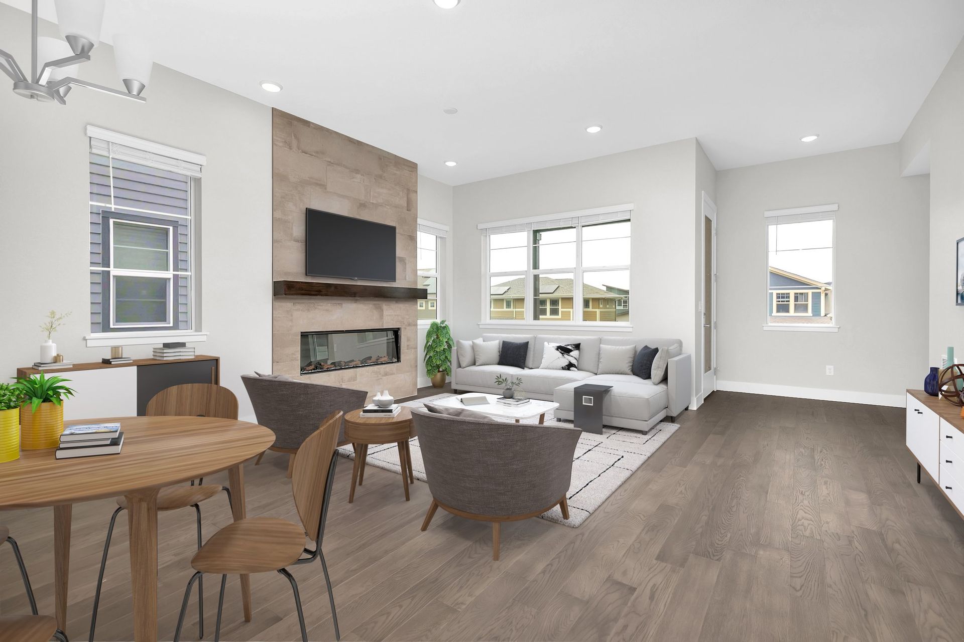 A car is parked in front of a large apartment building.