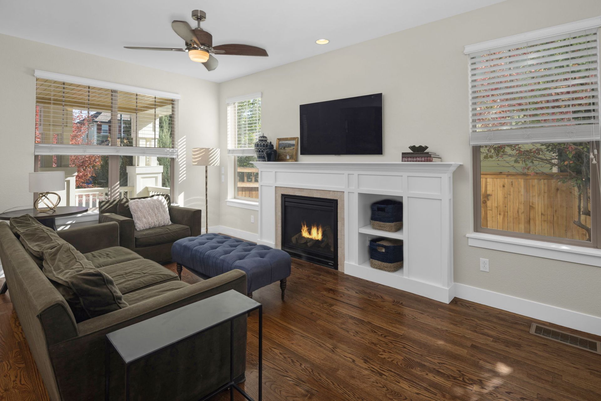 A bathroom with a toilet , sink , and bathtub.