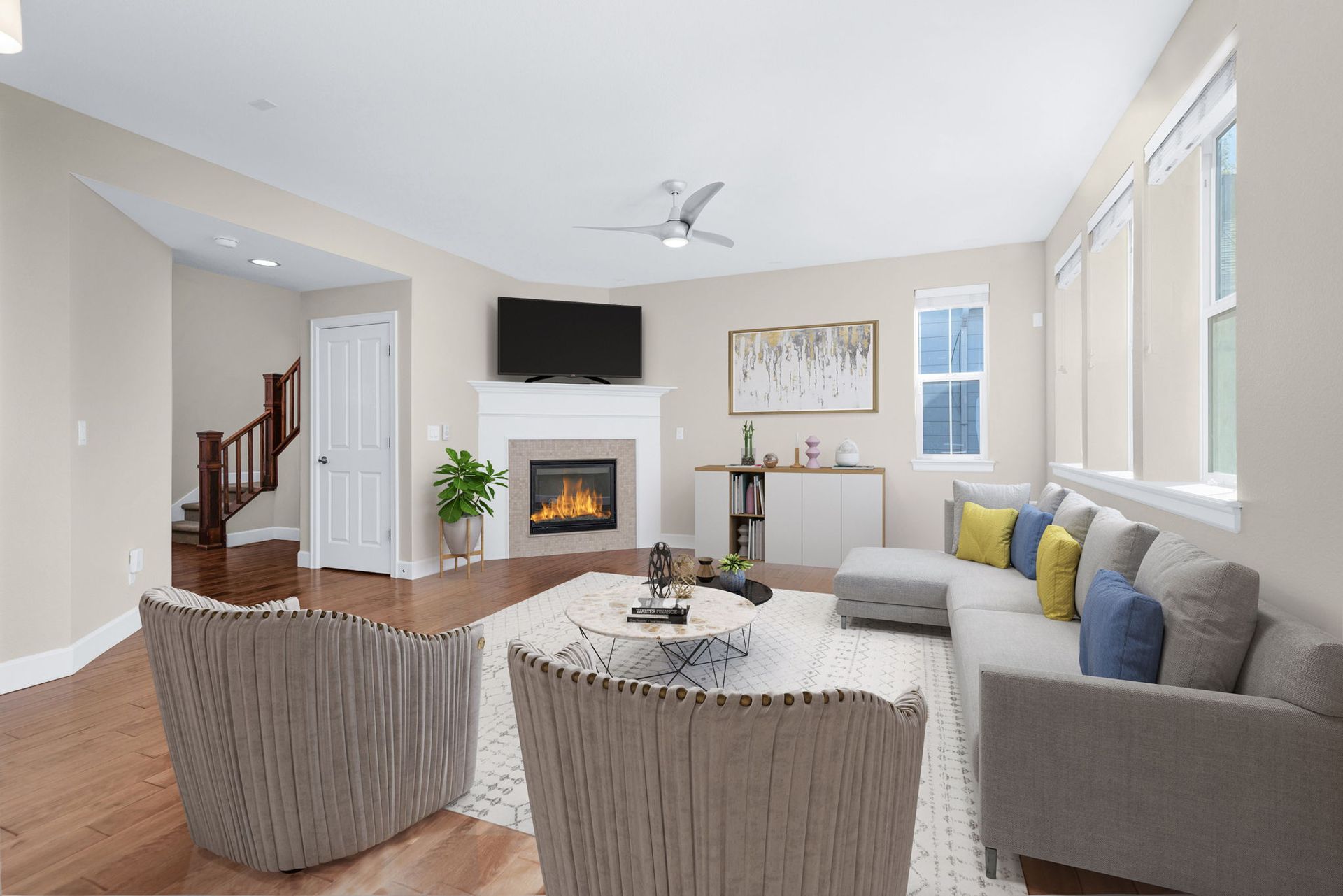 A bathroom with a sink , toilet , shower and mirror.