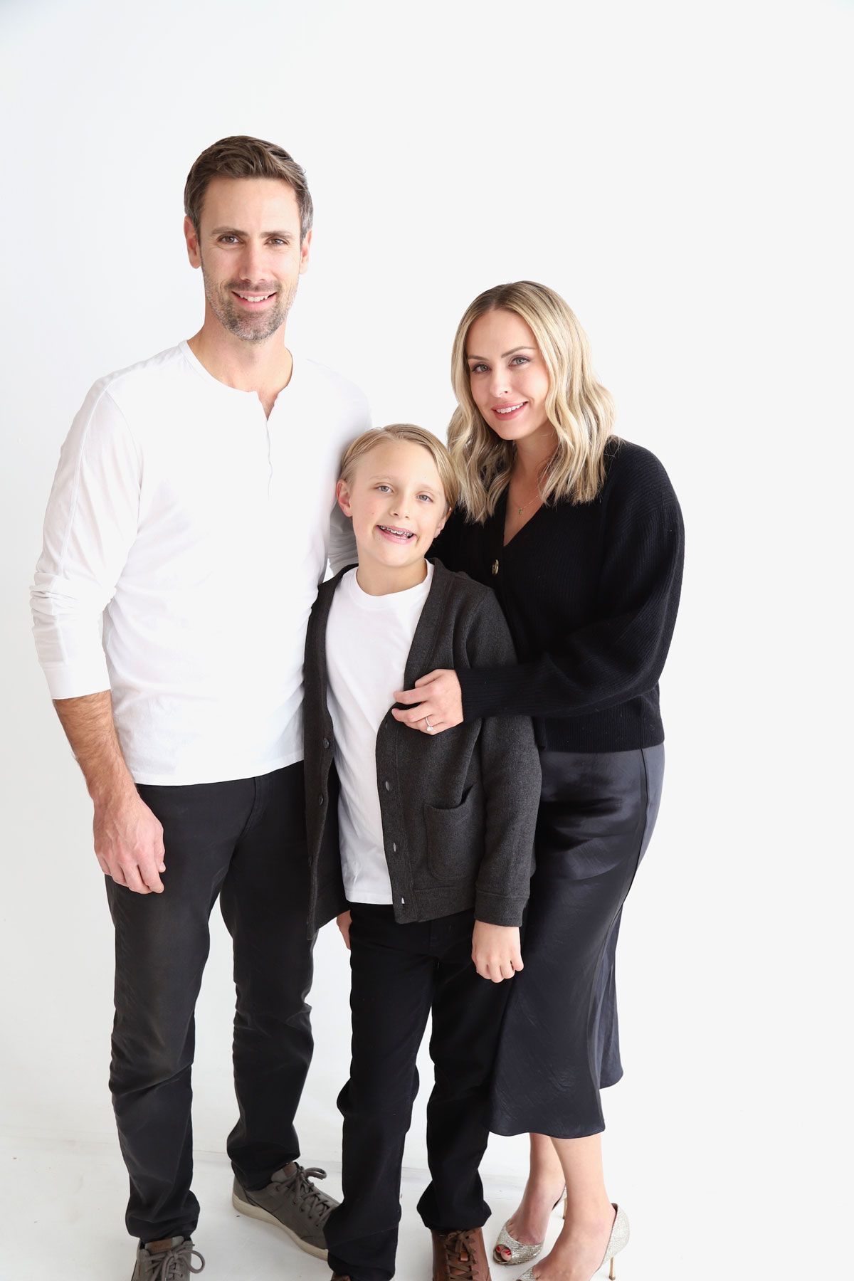 A woman and a little girl are sitting on a boat.