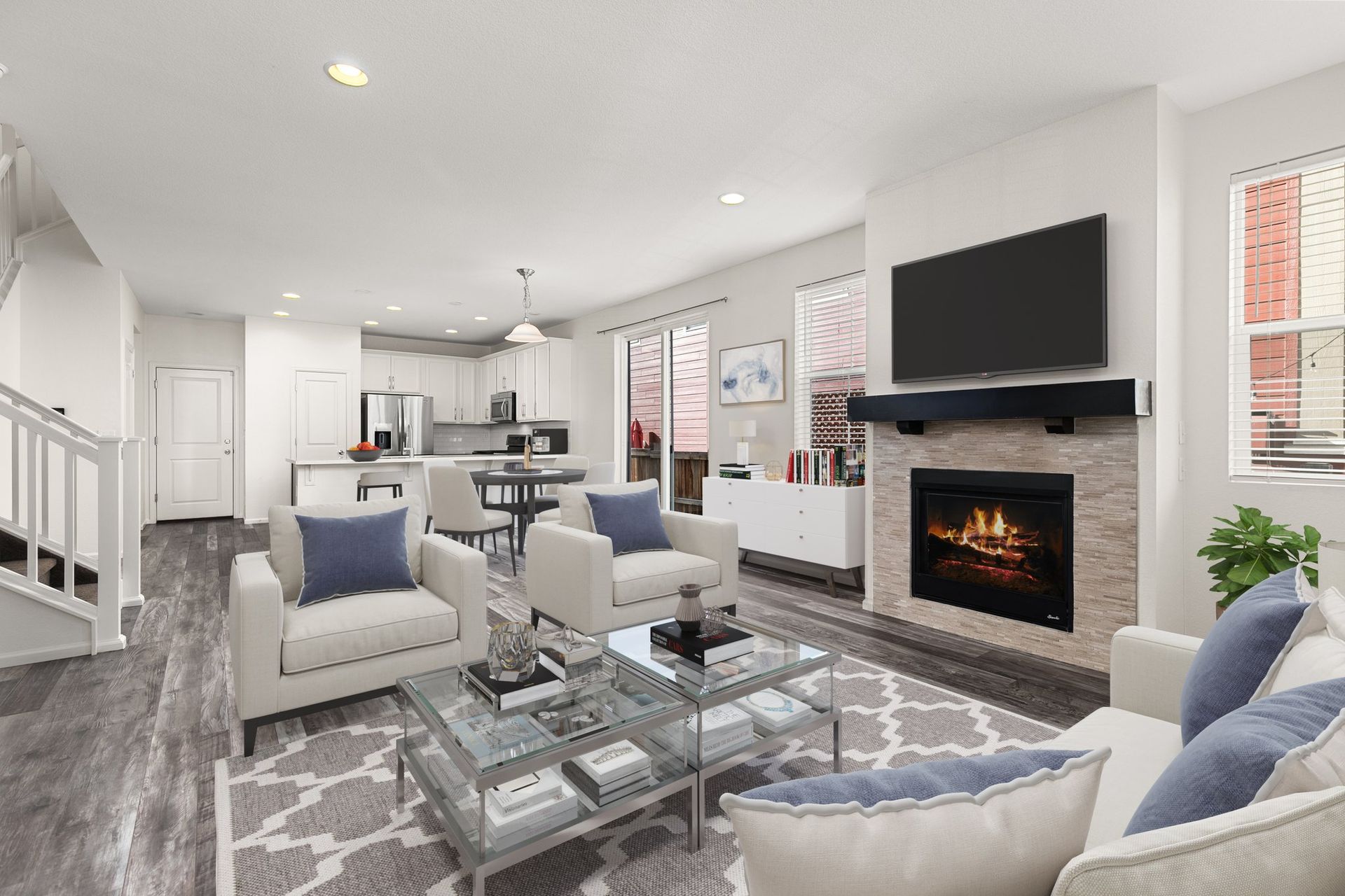 A house with snow on the ground in front of it