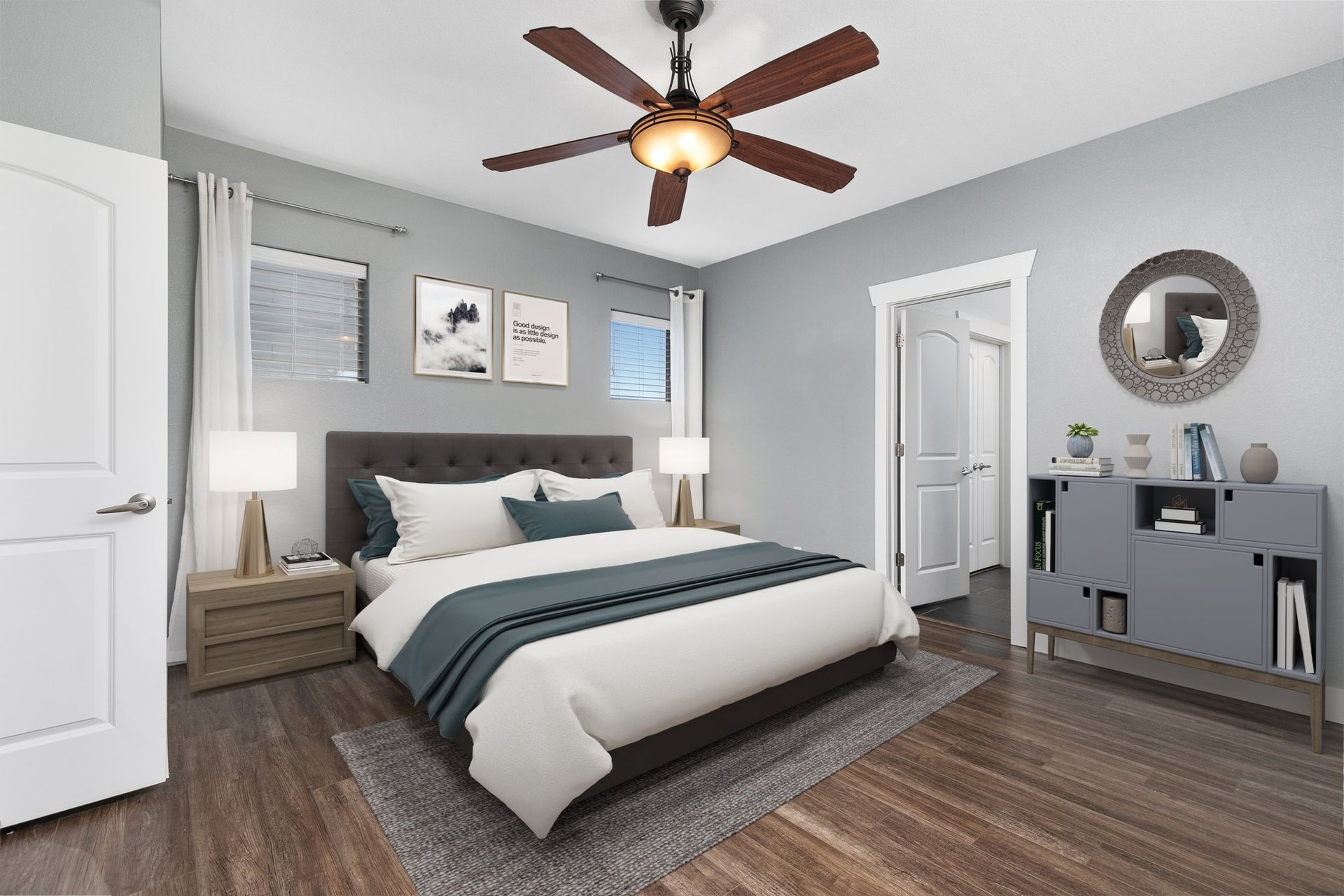 A garden with a walkway leading to it and a fence surrounding it.