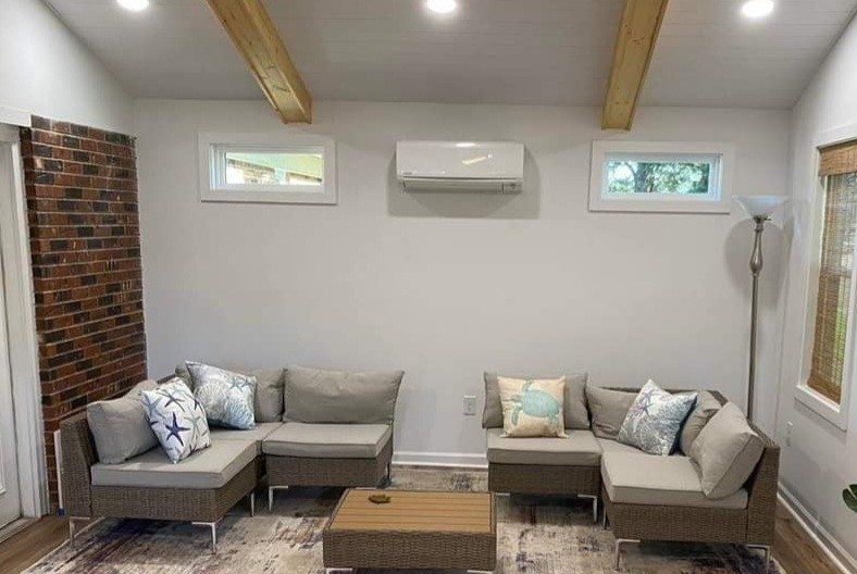 Living Room with Air Conditioner— Mooresville, NC — Sutton’s HVAC Services