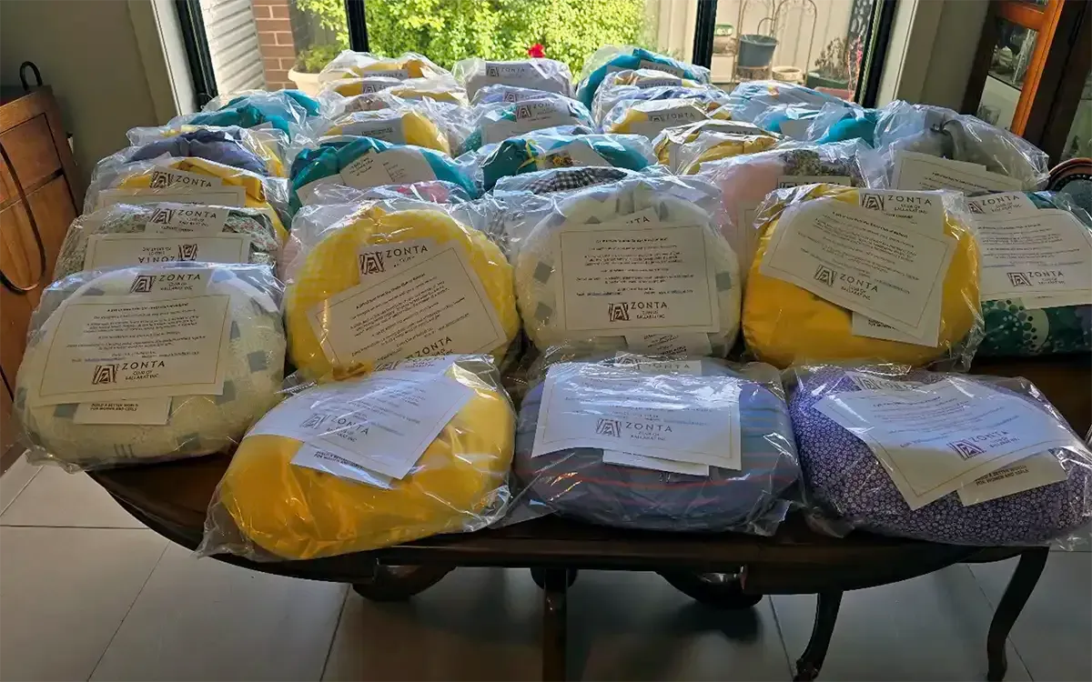 Zonta Club of Ballarat members and volunteers working on breast cushions