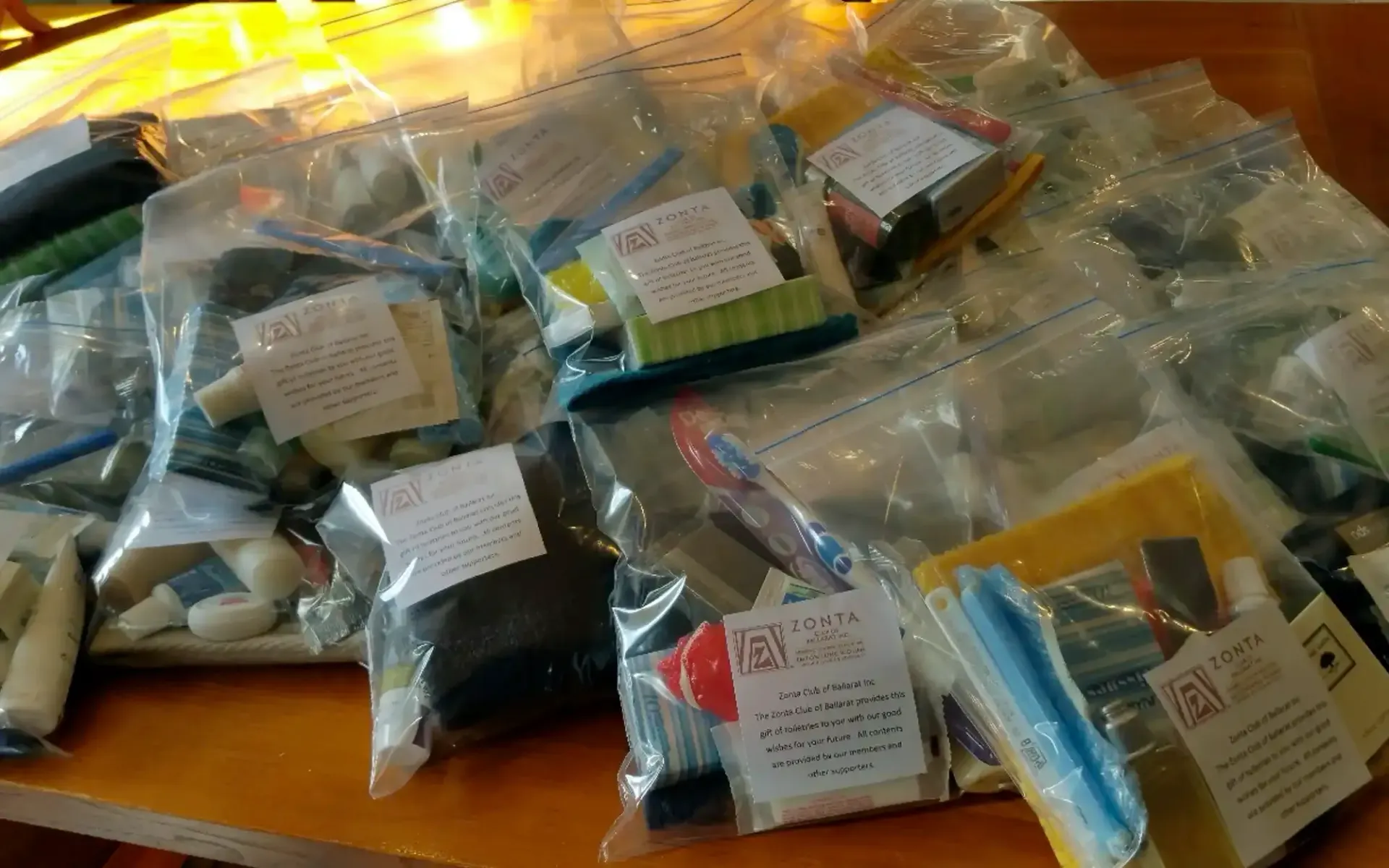 Zonta Club of Ballarat members and volunteers working on breast cushions