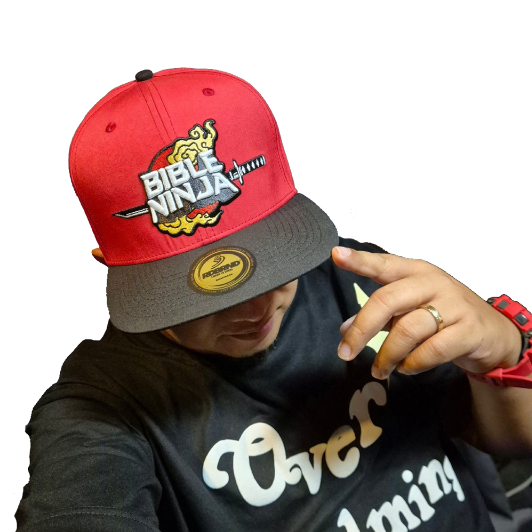 A man wearing a hat that says bible ninja