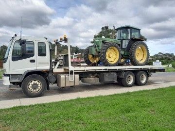 Tractor Being Pulled by a Pickup Truck | Melbourne VIC | Melbourne Towing