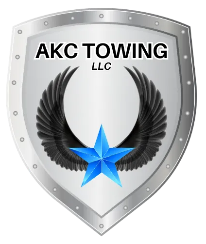 AKC Towing logo: silver shield with wings, blue star, and text "AKC TOWING LLC".
