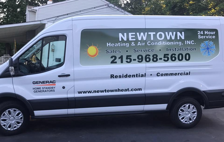 Repair Man Holding A Wrench — Langhorne, PA — Newtown Heating & Air Conditioning, Inc.