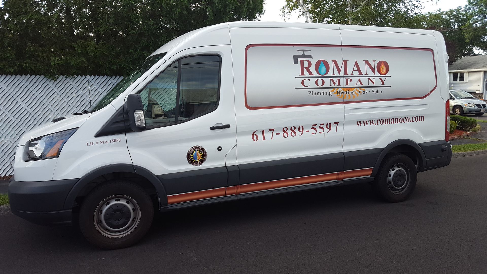 A white van with the word romano on it