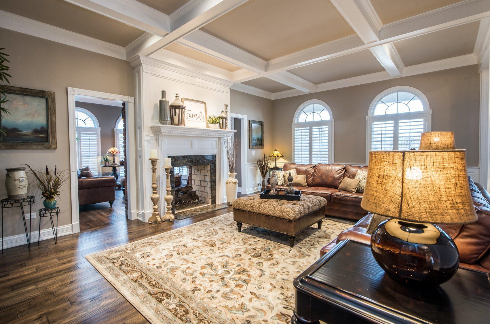 a living room filled with furniture and a fireplace .