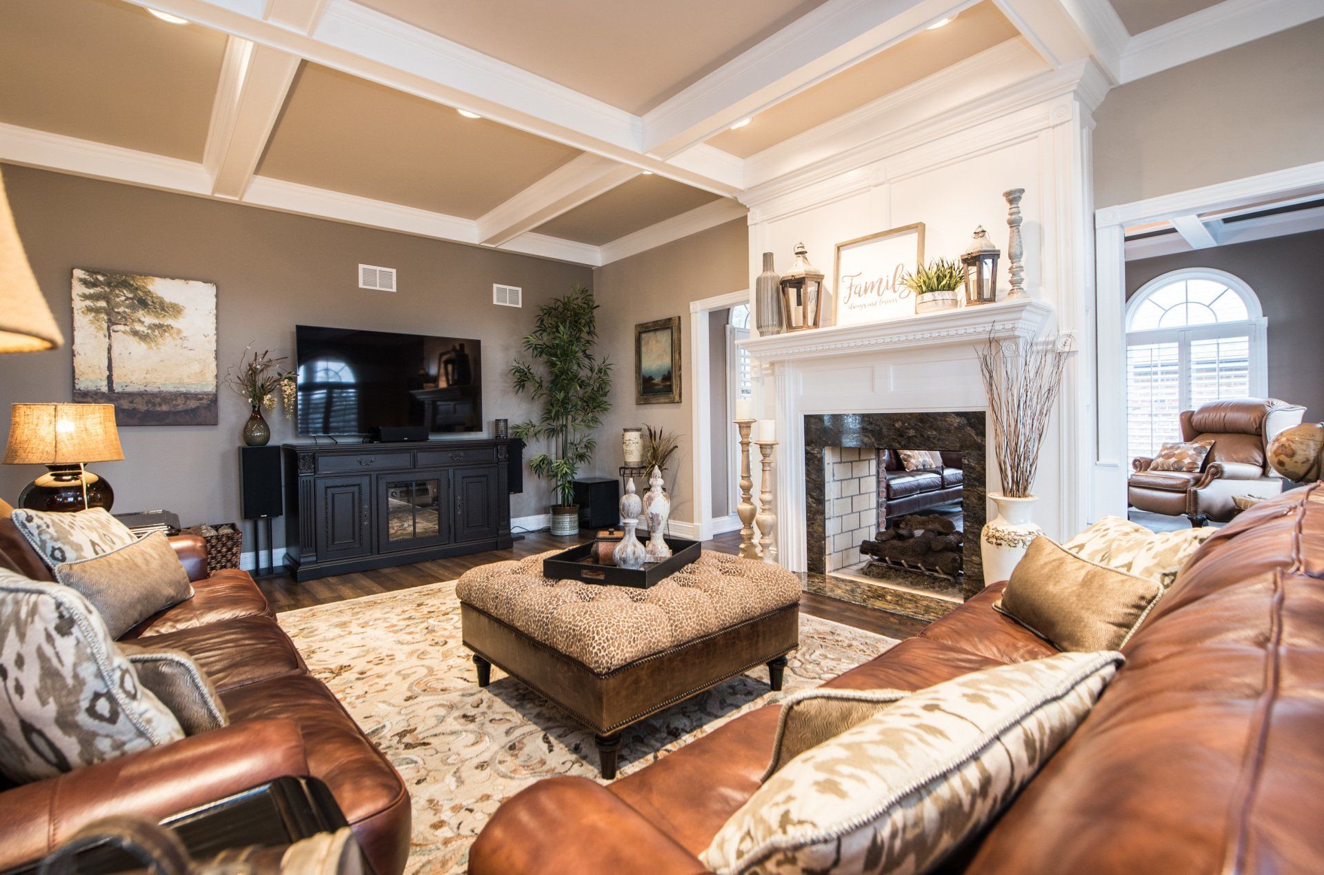 a living room filled with furniture and a fireplace .