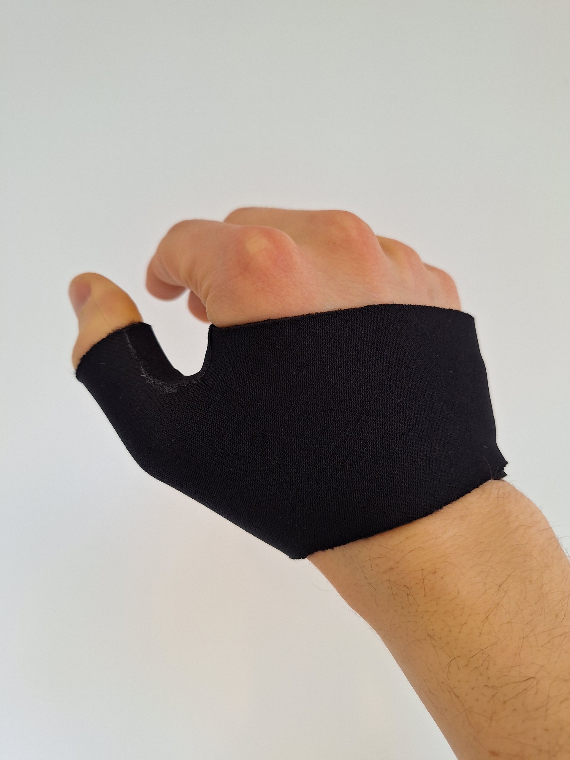 Zwarte zachte duimspalk van neopreen