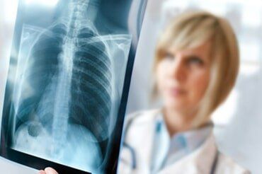 Doctor with X-ray Result — physicals in Smyrna, TN