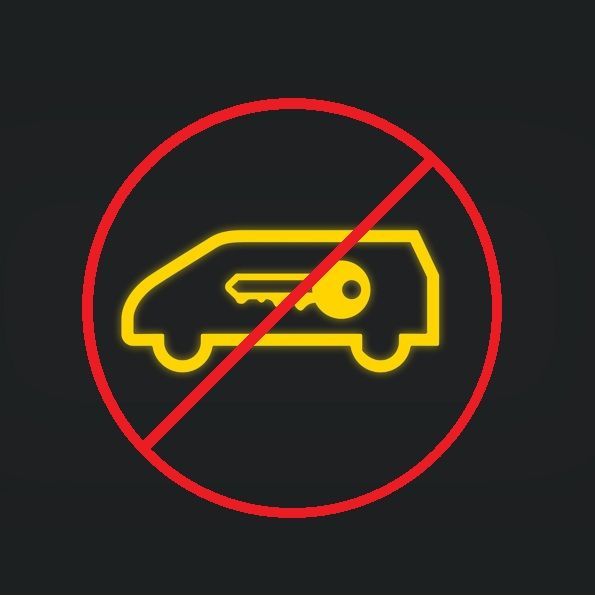 Yellow car key warning icon crossed out with a red prohibition symbol on a dark background