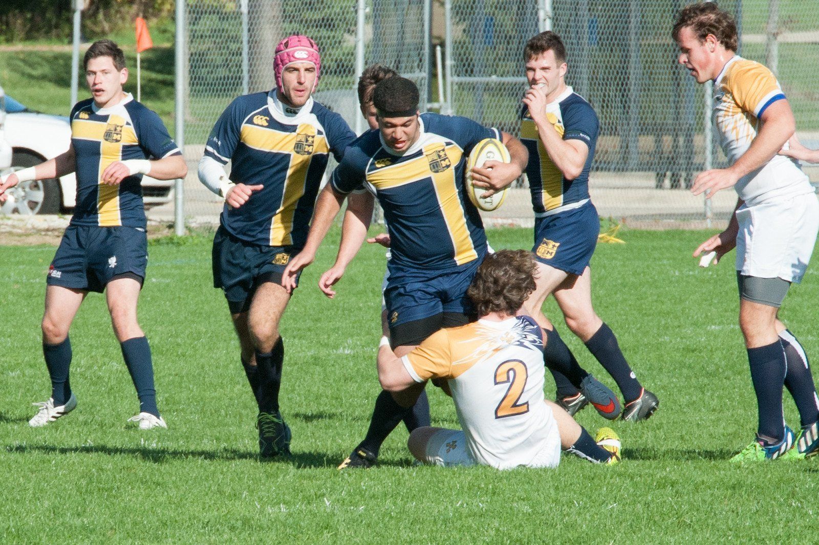 A rugby player with the number 2 on his jersey
