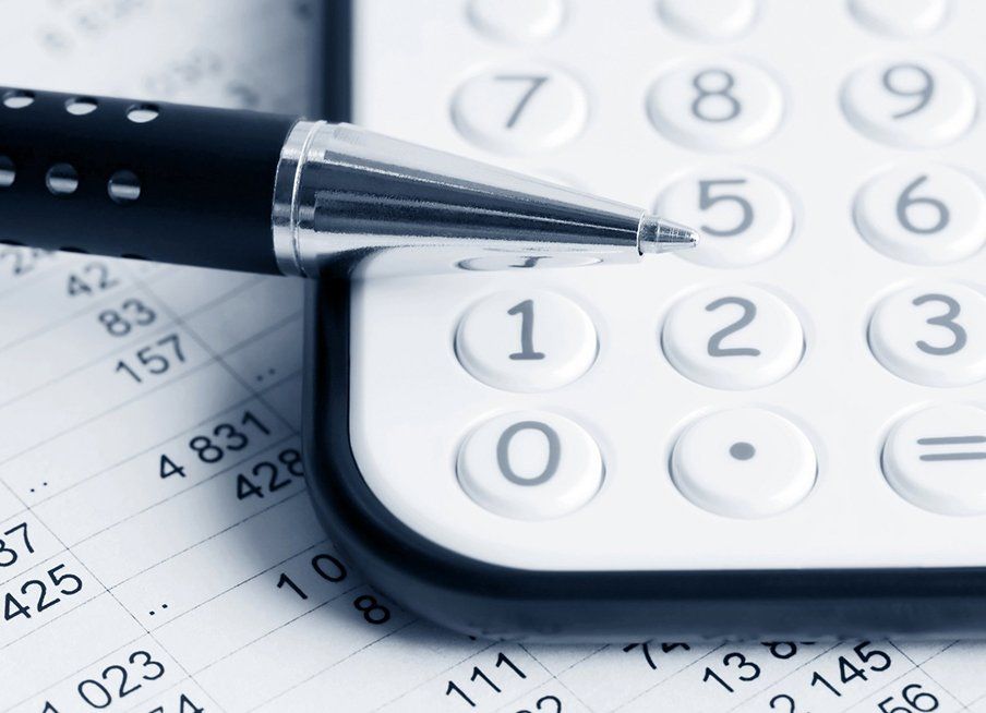 Calculator And A Pen — Outback Conveyancing Services in Alice Springs, NT