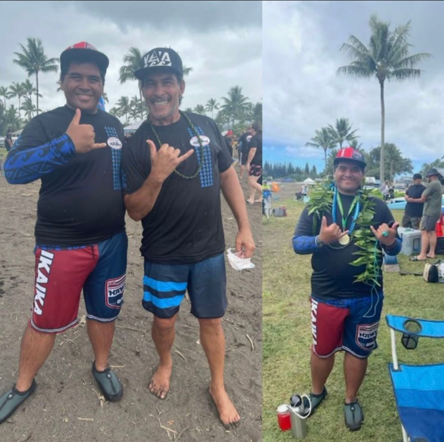 A man wearing a hat with the letter a on it