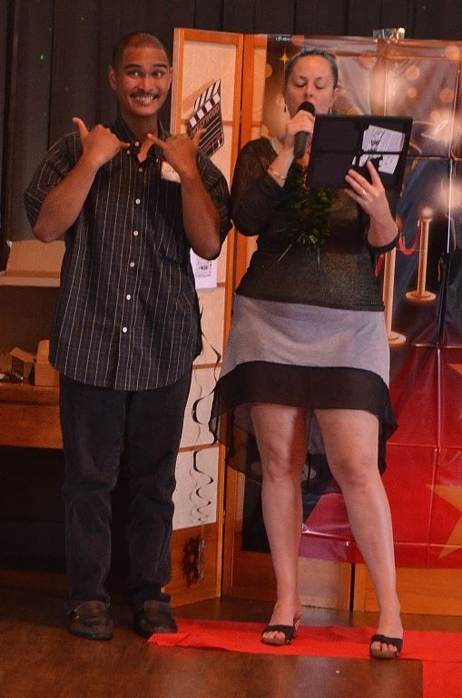 A man and a woman are standing next to each other
