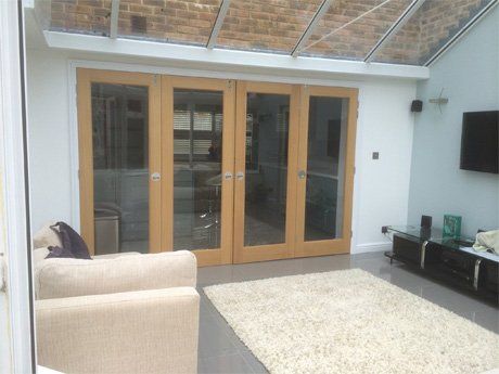 extension with brown, glass doors