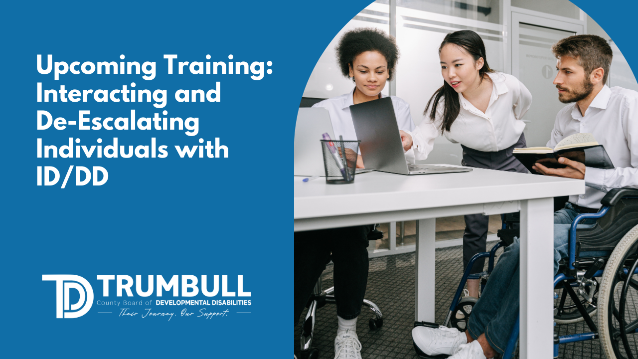 A blue graphic with a photo of individuals at a work table.